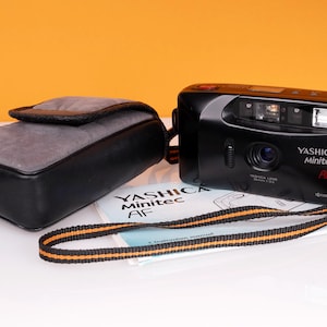 Yashica Mintec AF film camera with soft case and instructions