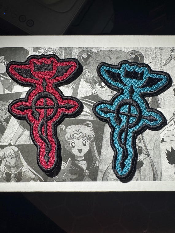 Fullmetal Alchemist Brotherhood Flamel 3.5x2.2 inch iron on backed embroidered patch.
