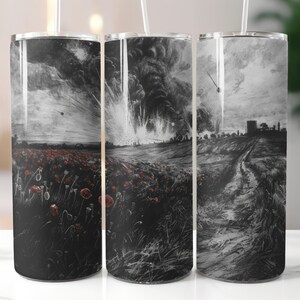 May include: Three stainless steel tumblers with a black and white image of a field of red poppies with a path leading to a distant town. The image is reminiscent of a war scene.
