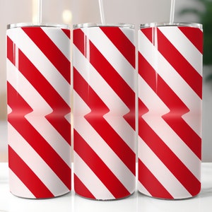 May include: Three red and white striped stainless steel tumblers with lids. The stripes are diagonal and create a candy cane pattern.