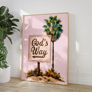 Könnte beinhalten: Ein rosa und braunes Poster mit einer Palme und einem Schild mit der Aufschrift "God's Way" und einem nach links zeigenden Pfeil.