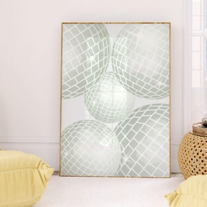 May include: A framed print of an abstract design featuring four overlapping, white, mirrored spheres with a grid pattern. The spheres are arranged in a cluster, creating a sense of depth and dimension.