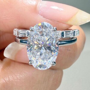 Unique White Gold Oval Cut Moissanite Engagement Ring Set 4.5 TCW with Solitaire and Baguette Eternity Band Elegant Wedding Jewelry for Her