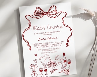 May include: Red and white bridal shower invitation with the text "That's Amore" and a red bow. The invitation includes details for the event, including the date, time, location, and RSVP information. The bottom of the invitation features a red illustration of a pizza, wine glasses, and grapes.
