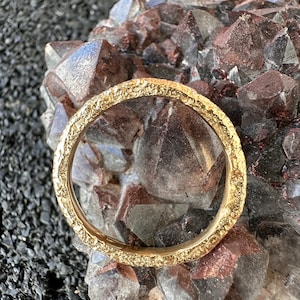 14ct gold hand made wedding band, made from recycled gold any size or width made to order.  Unique hand made piece.
