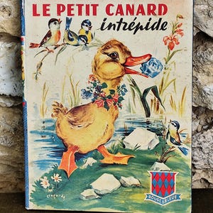 Buchen Sie die kleine unerschrockene rote und blaue Ente, Text von Pierre Maniquaire, Illustrationen von Luce Lagarde Editions GP 1957