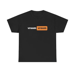 May include: Black t-shirt with the text "vroom vroom" in white letters inside an orange rectangle.