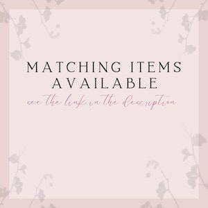 text that reads "Matching Items Available" and "see the link in the description". The text is in a casual, handwritten style and is placed against a pink background with a floral pattern.