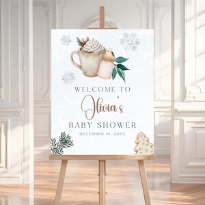 Cartel de bienvenida para baby shower de invierno con texto "Hace frío afuera", plantilla editable BS36 para baby shower de niña y niño en el País de las Maravillas Invernales.