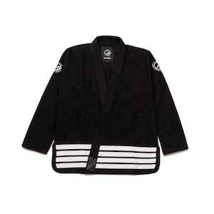 May include: Black martial arts uniform with white stripes and logos. The uniform features a V-neck collar and a wrap-around belt. The logos are on the sleeves and the back of the jacket. The uniform is designed for martial arts training and competition.