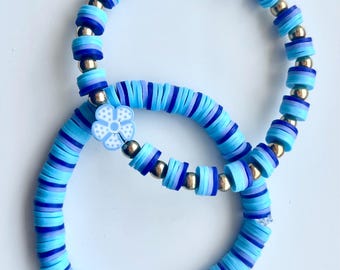 A Set of Blue flower clay beaded bracelets