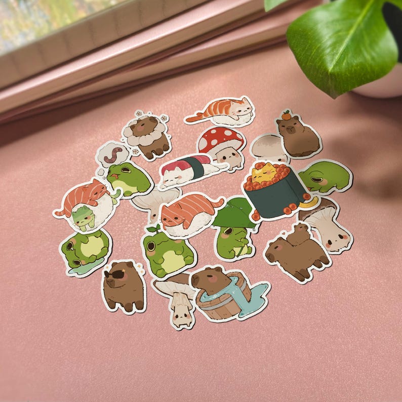 May include: A set of 20 colorful stickers featuring various animals, including frogs, cats, capybaras, and mushrooms. The stickers are designed in a cartoon style and are perfect for adding a touch of whimsy to laptops, water bottles, or journals.