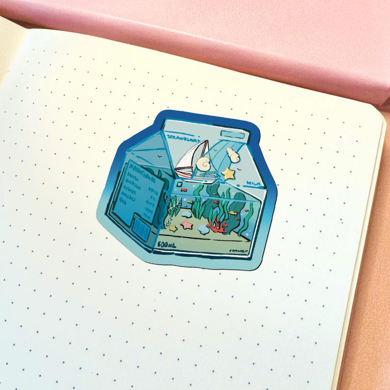 May include: A die-cut sticker shaped like a milk carton with a blue gradient, featuring an underwater scene with seaweed, starfish, and shells. A small sailboat floats on the surface, and the text reads Strawberry Milk and 500ml.