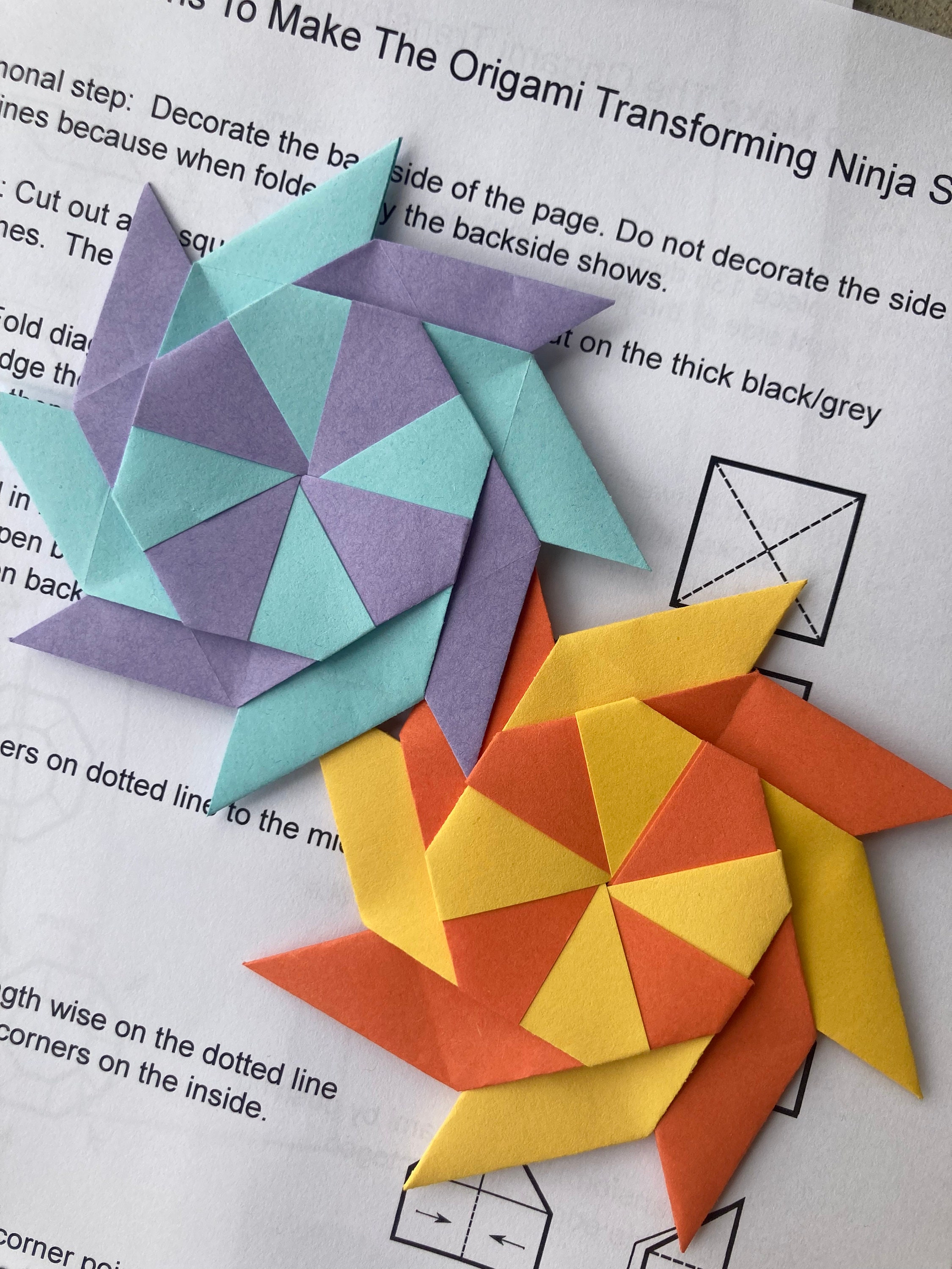 It's so much fun to make folded ninja stars from origami paper