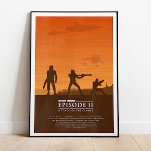 May include: A minimalist poster for Star Wars Episode II: Attack of the Clones. The poster features a silhouette of three figures against a sunset-colored background. The text "Star Wars Episode II Attack of the Clones" is printed in white at the bottom of the poster.