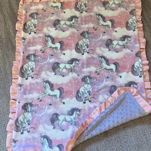 Homemade baby blanket - double sided fleece with satin binding