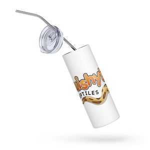 May include: White stainless steel tumbler with a lid and straw. The tumbler has a graphic of a snake with the text "Lushyt Reptiles" on it.