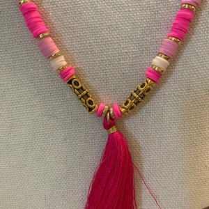 Pink heishi bead necklace with tassel