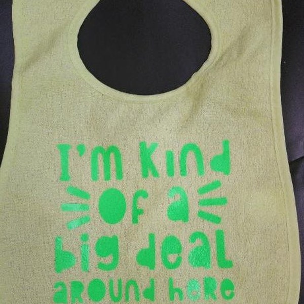 I'm kind of a big deal Baby Bib in pastel lime with neon lime writing