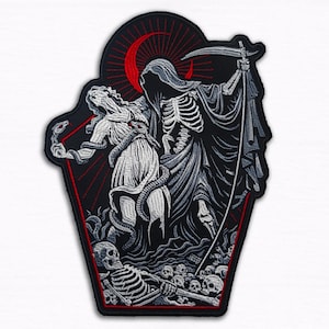May include: Embroidered patch featuring a grim reaper figure with a scythe, standing over a woman entwined with snakes. The design includes a red crescent moon and a skeleton at the bottom, all set against a black background.