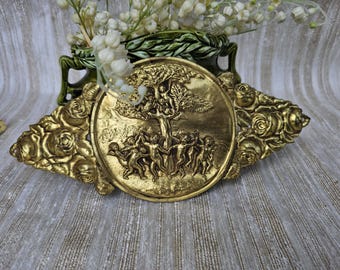 Vintage brass baroque signs, biblical angel