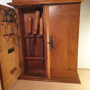 Antique tool cabinet - carpenter&#39;s wooden cabinet around 1920s