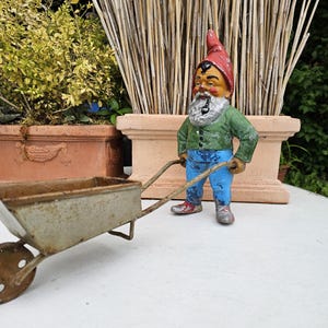Vintage garden gnome with wheelbarrow aluminum and iron 1930s