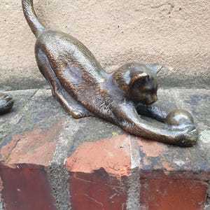 Bronze figure lying cat playing with ball kitten sculpture decoration 1 piece
