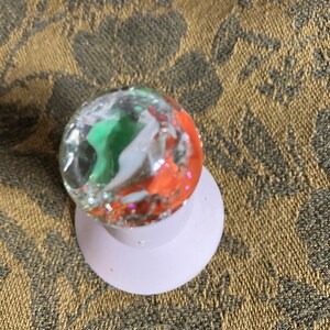 Shooter Marble With Orange And Green Color