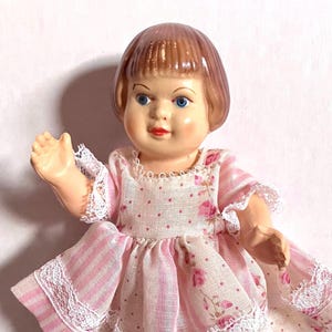 Vintage Doll With Original Dress Made Of Celluloid