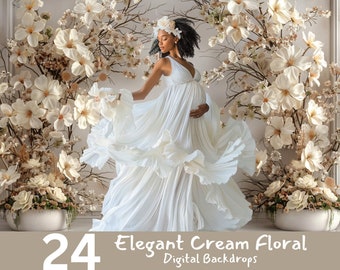 May include: 24 Elegant Cream Floral Digital Backdrops. A pregnant person in a white dress stands in front of a backdrop of white flowers and greenery.