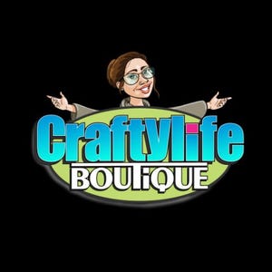 May include: A cartoon logo for CraftyLife Boutique, featuring a woman with glasses and a bun, arms outstretched. The text "CraftyLife" is in blue and white, above "BOUTIQUE" in white, all on a green oval.