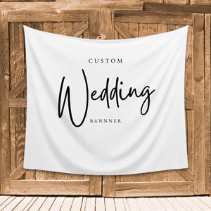 May include: White fabric banner with black text that reads "CUSTOM Wedding BANNER".