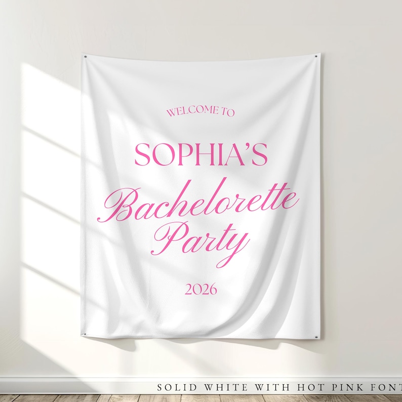 White fabric tapestry banner back drop with custom hot Pink text in an upscale trendy font, customized with the bride's name, her bachelorette party theme and additional personalized details as well as a graphic to coordiate with the theme and decorations. Perfect for a welcome sign or photo background backdrop.