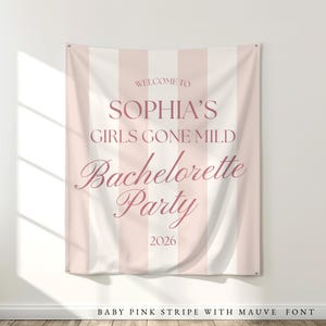 Girls Gone Mild Bachelorette Decorations: Pastel pink striped fabric tapestry banner back drop with custom mauve text in an upscale trendy and elegant font, customized with the bride's name, her bachelorette party theme and additional personalized details as well as a graphic to coordiate with the theme and decorations. Perfect for a welcome sign or photo background backdrop.