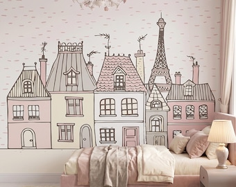 May include: A wall mural featuring a hand-drawn illustration of a Parisian streetscape with pastel pink, cream, and gray buildings and the Eiffel Tower. The design includes multiple windows, chimneys, and roof details on a light pink background.