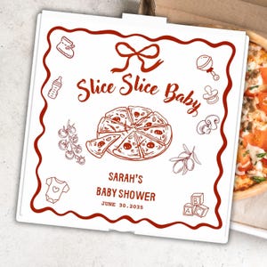 May include: A white pizza box with a red border and illustrations for a baby shower. The box features the text "Slice Slice Baby" and "Sarah's Baby Shower, June 30, 2035". The box contains a pizza.