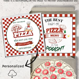 May include: A square pizza box with a red and white checkered border. The lid features a circular graphic with a chef, a pizza slice, and text reading "HOT AND FRESH PIZZA MADE WHIT LOVE FROM MOM'S KITCHEN HAPYY BIRTHDAY". Inside, US dollar bills are arranged in a circular pattern with red circular paper accents.