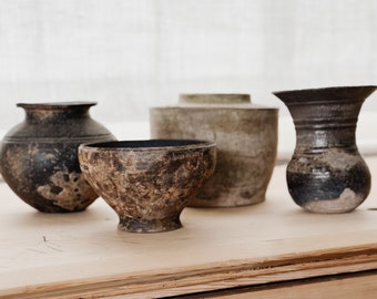 Antique chinese han era pottery vessels (202 bce - 220 ce)