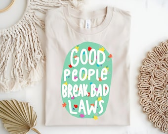 Good People Break Bad Laws T-Shirt | Bright Floral Graphic | Human Designed, No AI Art