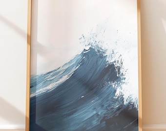 May include: A framed art print featuring an abstract depiction of a wave. The artwork showcases shades of blue and white, creating a dynamic and textured effect. The print is encased in a light brown wooden frame, suitable for home decor.
