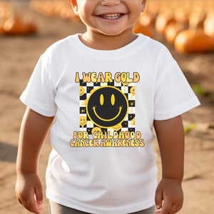 I Wear Gold For Childhood Cancer Awareness Baby TShirt/Pediatric Cancer Fighter Survivor Warrior Shirt/Gold Ribbon Child Chemo Treatment Tee