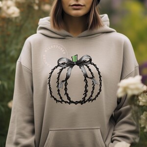Melanoma Black Ribbon Coquette Fall Pumpkin Hoodie/Melanoma Awareness Cancer Autumn Gift Shirt/Melanoma Survivor Fighter Warrior Gift Hoodie