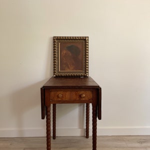 19th century drop leaf table with bobbin legs