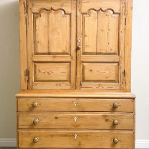 Antique English pine linen press cabinet