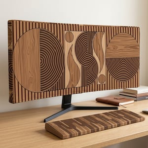May include: A wide computer monitor and a matching keyboard, both featuring a brown and tan wood-grain pattern with geometric circles, vertical stripes, and curved lines. The design creates a cohesive look across the screen and the input device.