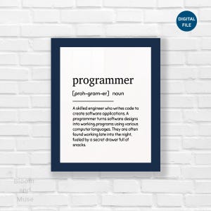 May include: A dark blue framed wall art print featuring a dictionary-style definition of the word programmer. The text reads: programmer [proh-gram-er] noun. A skilled engineer who writes code to create software applications. A programmer turns software designs into working programs using various computer languages. They are often found working late into the night, fueled by a secret drawer full of snacks.