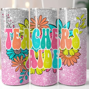 May include: Three silver glitter tumblers with pink glitter accents. Each tumbler features a floral design with the text "Teacher's Aide" in colorful retro lettering.