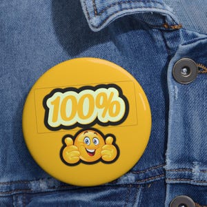 May include: A yellow button with a smiling emoji and the text "100%" in a black rectangle.