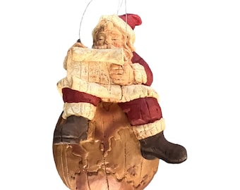 1992 Santa Ornament Sitting On the World Rustic Wood Look Plastic 5.5 Inches Christmas